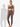 Shakti Warrior brown one-shoulder scallop detail sports bra and scallop detail leggings