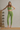 Front view Shakti Warrior AuraLux high support sports bra and leggings set in sage green