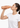Woman drinking from a copper water bottle against a white background