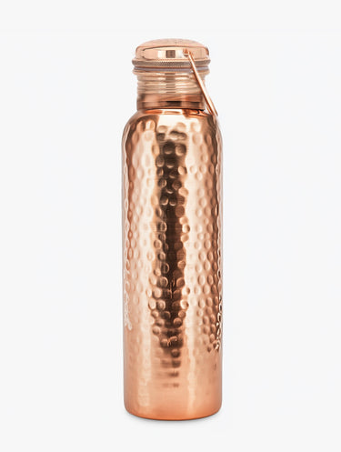 Shakti Warrior hammered copper water bottle with textured finish