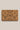 Cork yoga block with floral patterns on a beige background