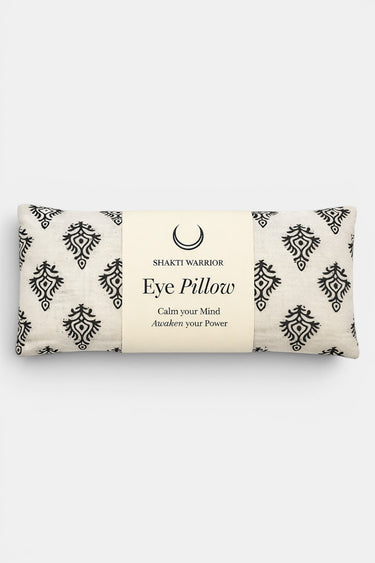 Shakti Warrior eye pillow with black patterns on a white background