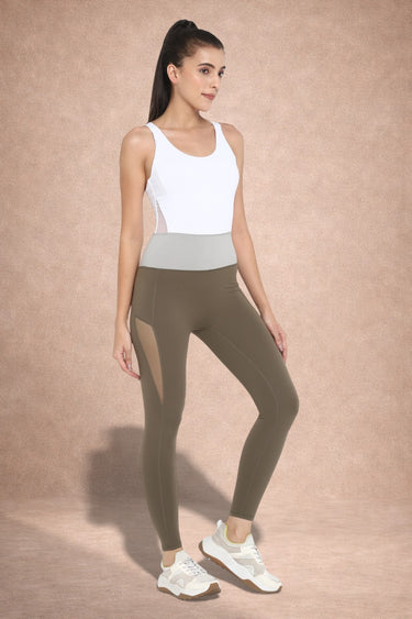 Woman wearing Shakti Warrior a high support one piece high support leotard