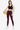 Woman wearing Shakti Warrior high support AVA lace sports bra during basketball