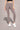Woman wearing second skin fitted gray leggings
