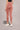 Woman wearing Shakti Warrior Rise Support Leggings in Dusty Rose