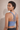 Side view of Shakti Warrior blue medium support RE sports bra
