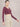 Woman wearing Shakti Warrior RE in burgundy cross back crop top