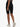 Woman wearing Shakti Warrior High-Rise AuraLux Biker Shorts in Black