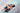 Woman practicing yoga on Shakti Warrior eco friendly 6mm TPE feather yoga mat