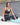 Woman practicing yoga on Shakti Warrior eco friendly 6mm TPE feather yoga mat