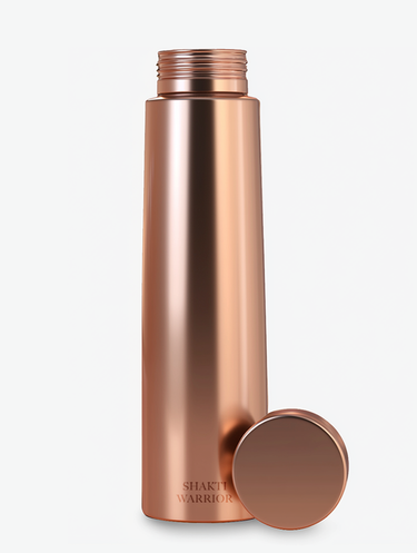Modern flat lay of Shakti Warrior sleek copper water bottle
