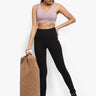 Person using Shakti Warrior cork fabric meditation bolster during meditation or restorative yoga
