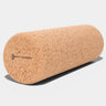 Cork yoga roller on a light gray background