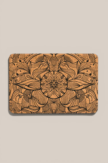Cork yoga block with floral patterns on a beige background