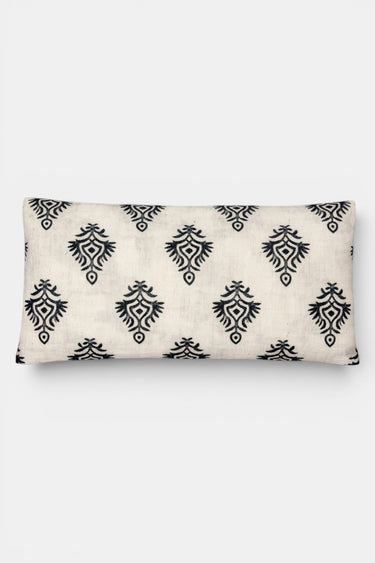 Eye pillow with black geometric pattern on a white background