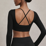 Woman wearing Shakti Warrior RE in black cross back crop top