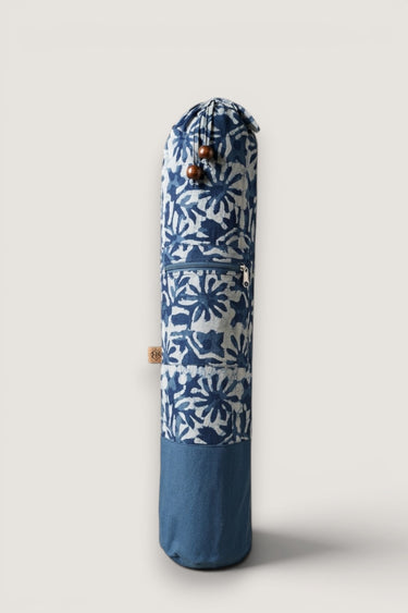 Blue and white patterned yoga mat bag on a white background