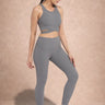 Shakti Warrior INARE medium support sports bra and leggings set in gray side view